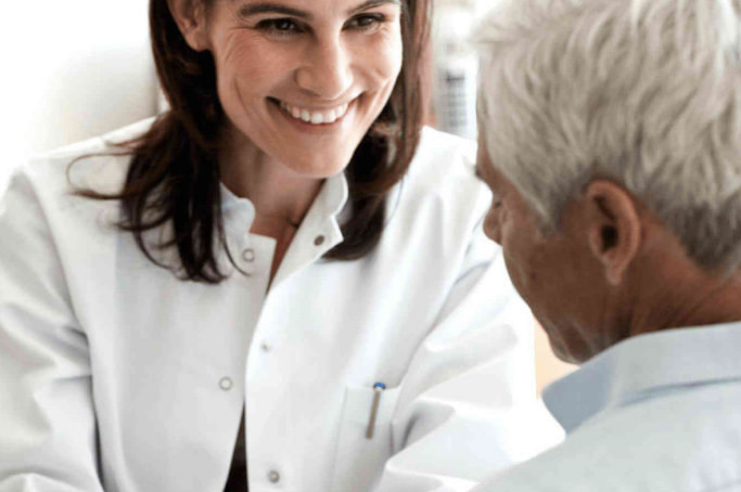 audiologist_showing_hearing_aids
